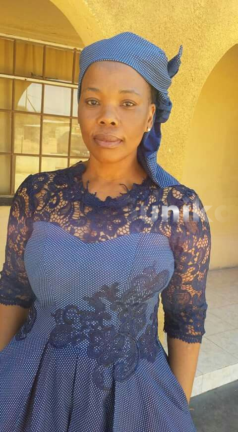 Blue Shweshwe Sotho dress with lace